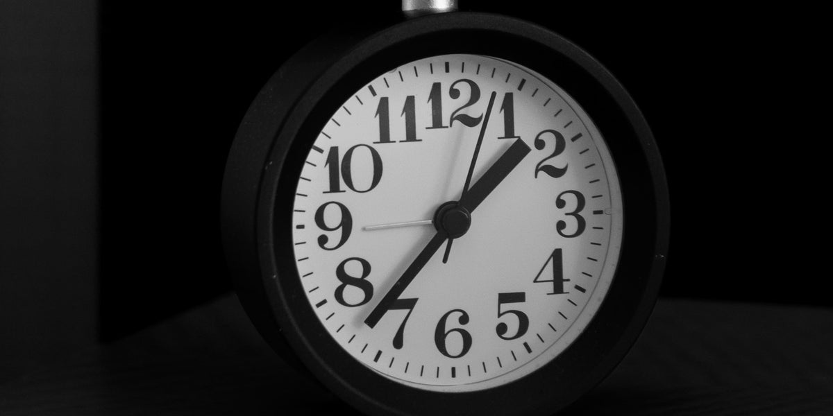 alarm clock in dark - perimenopause, sleep and stress